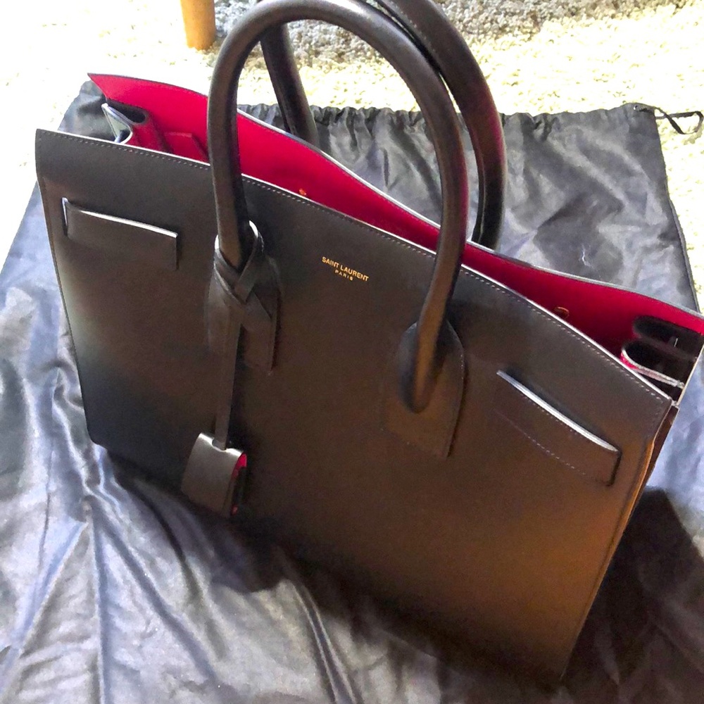 Ysl bag with dust bag. Long strap missing.